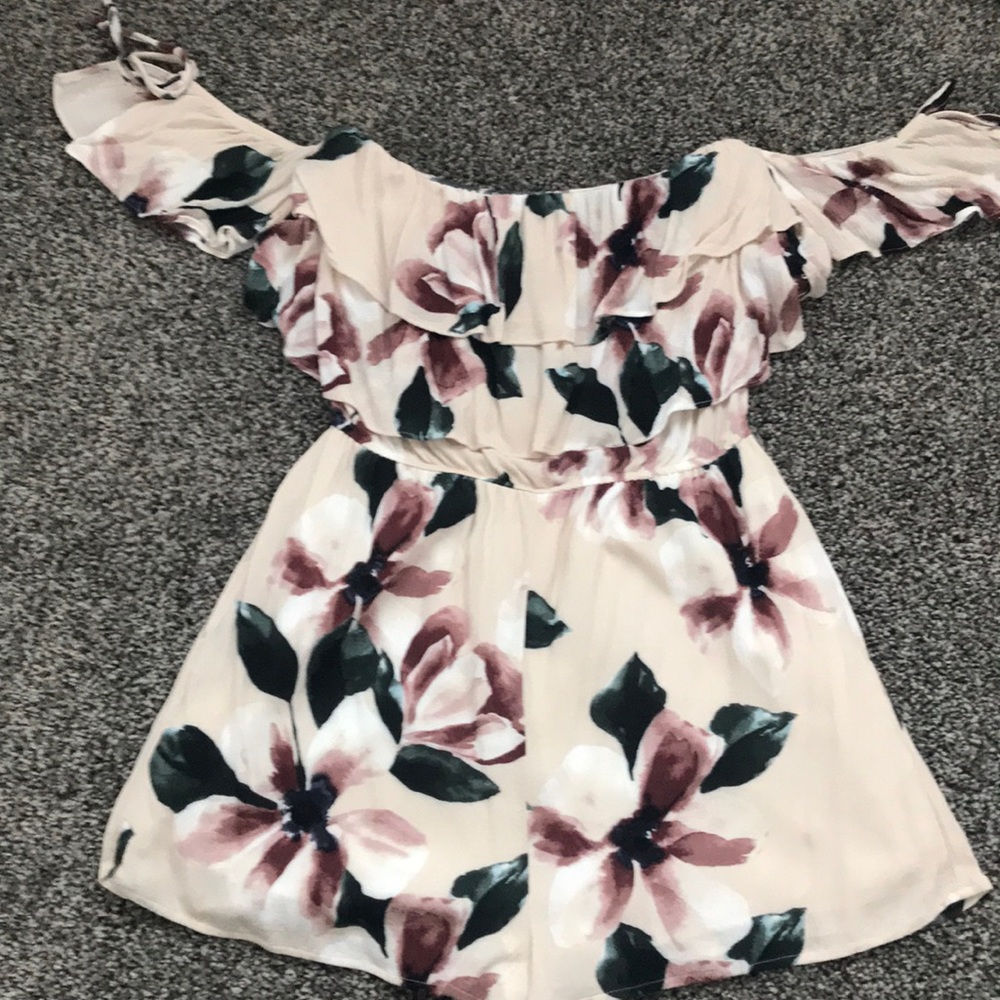 Cream romper with flower detail